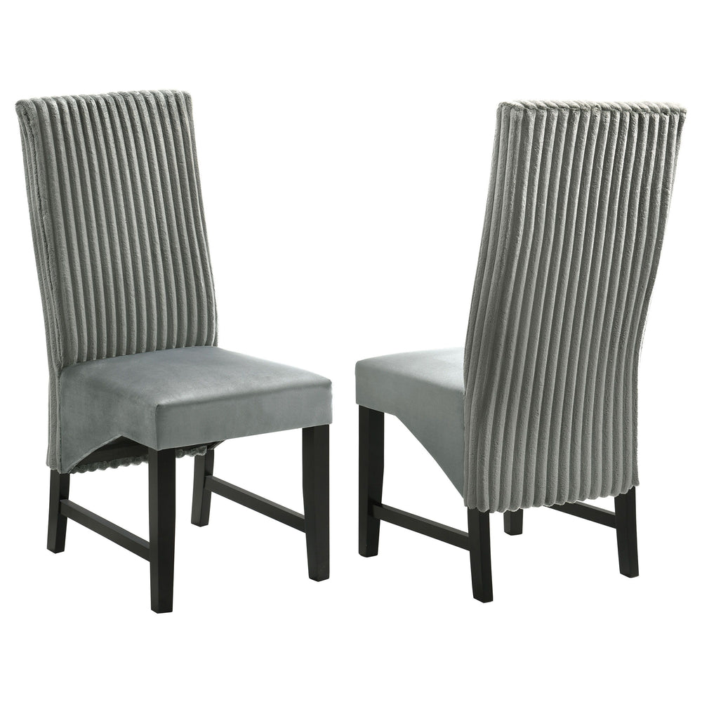 Elevate your dining space with these sophisticated dining chairs, blending textures and luxurious fabrics for a modern, elegant look. The seat back features wide channel corduroy upholstery, adding rich texture and a stylish visual contrast. The seat itse