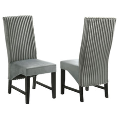 Elevate your dining space with these sophisticated dining chairs, blending textures and luxurious fabrics for a modern, elegant look. The seat back features wide channel corduroy upholstery, adding rich texture and a stylish visual contrast. The seat itse