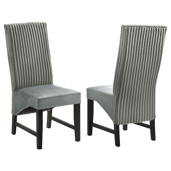 Elevate your dining space with these sophisticated dining chairs, blending textures and luxurious fabrics for a modern, elegant look. The seat back features wide channel corduroy upholstery, adding rich texture and a stylish visual contrast. The seat itse