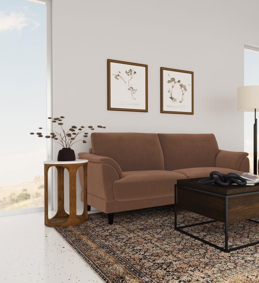 Unwind in style with this chic retro-inspired sofa, designed to deliver both comfort and timeless elegance. Upholstered in a rust woven fabric, it features plush foam seat cushions and curved tufted arms for ultimate support. The fully encased engineered 