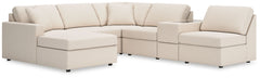 Looking cool and contemporary is great. But when it comes down to it, youâ€™re all about low-maintenance lounging. With the performance fabric on this sectional with chaise, cleaning spills is a breeze. Its customizable modular design caters to your ever-