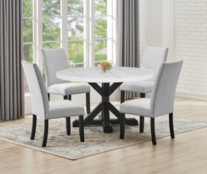 A fresh take on a traditional silhouette makes this group a great addition to your dining space. A genuine marble top is luxurious and timeless. Farmhouse style cross legs are updated in a contemporary charcoal finish. The upholstered dining chairs featur