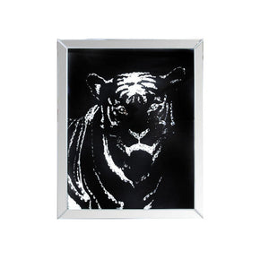 The Nevina crystal wall mirror is sure to be the focal point of any room. Dramatically cast with a tiger shaped mirror that is the perfect contrast against a black background. Faceted optic glass crystals adorn the skill layering it with added luxe and br