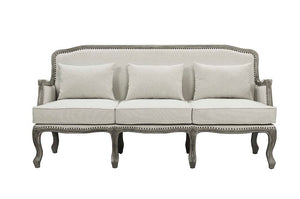  the Tania sofa flaunts a French cabriole silhouette that perches on graceful cabriole legs and showcases its antique-inspired profile. The nailhead trim accents give this piece a moder