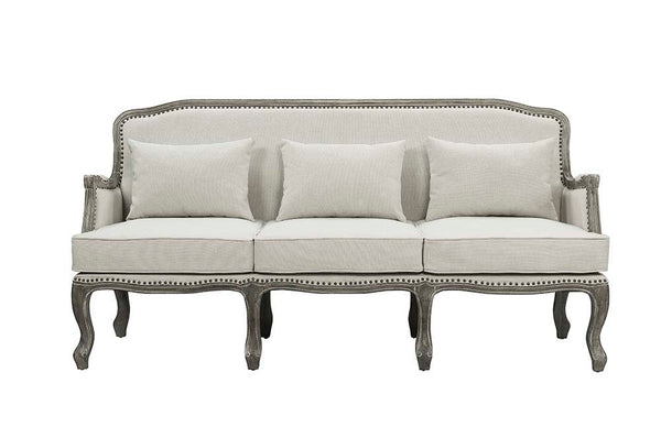  the Tania sofa flaunts a French cabriole silhouette that perches on graceful cabriole legs and showcases its antique-inspired profile. The nailhead trim accents give this piece a moder
