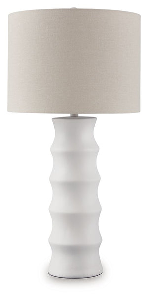 Add flair to your lair with this striking table lamp. With a distinctive scalloped design and a fresh white finish, itâ€™s cool from every angle. And its versatile style looks right at home everywhere from contemporary places to casual spaces. The matchin