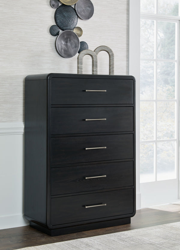  this softly shaped chest of drawers makes a lasting impression in a simply stunning way. Its magnificent curved silhouette is enhanced by a rich layered black finish on the textured wood grain surface. This is the statement pi