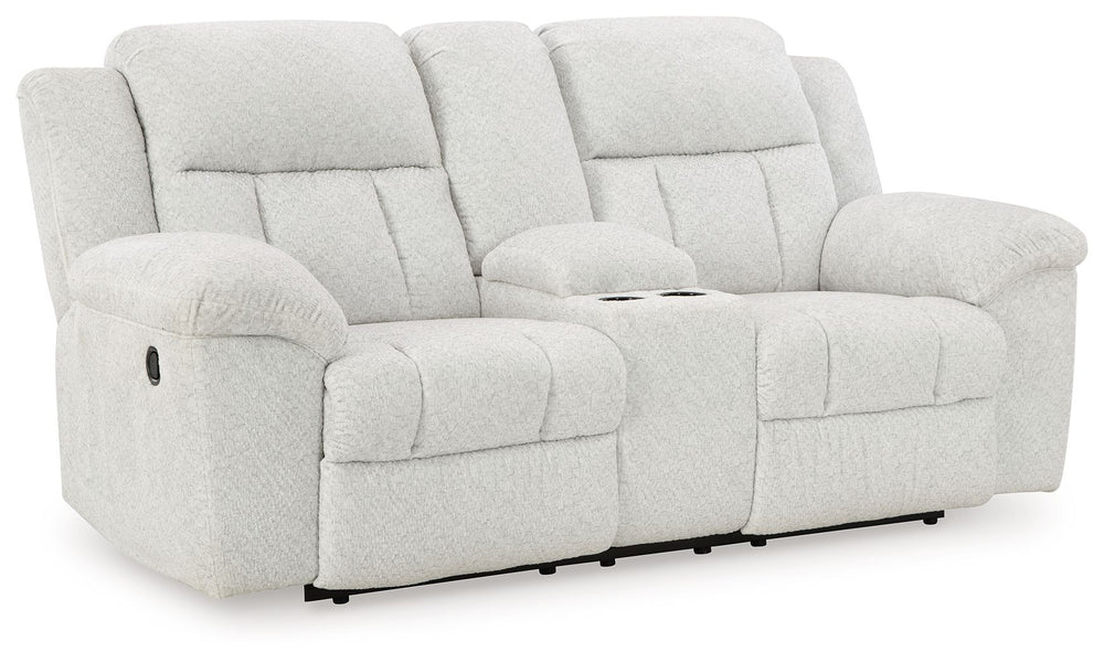 With its large-scale design, this extra-spacious reclining loveseat with console is a masterclass in accessible style. Plush, ultra-soft upholstery keeps everyone cozy as you lounge with family or guests. In a neutral hue, it seamlessly suits different ae