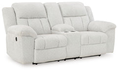 With its large-scale design, this extra-spacious reclining loveseat with console is a masterclass in accessible style. Plush, ultra-soft upholstery keeps everyone cozy as you lounge with family or guests. In a neutral hue, it seamlessly suits different ae