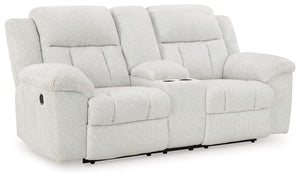With its large-scale design, this extra-spacious reclining loveseat with console is a masterclass in accessible style. Plush, ultra-soft upholstery keeps everyone cozy as you lounge with family or guests. In a neutral hue, it seamlessly suits different ae
