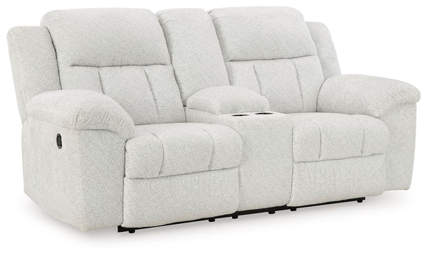With its large-scale design, this extra-spacious reclining loveseat with console is a masterclass in accessible style. Plush, ultra-soft upholstery keeps everyone cozy as you lounge with family or guests. In a neutral hue, it seamlessly suits different ae
