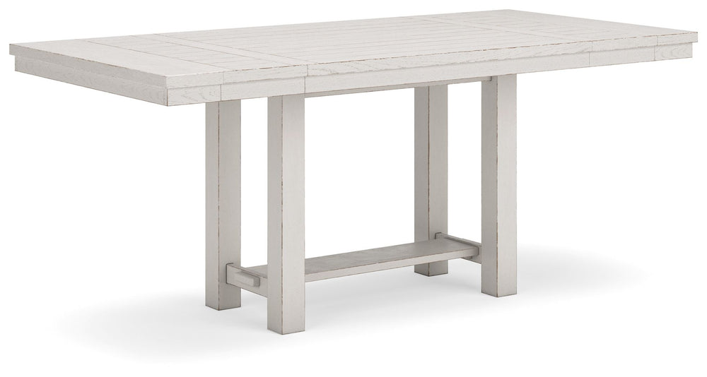 This counter height dining table is sure to impress come mealtime. With its antiqued white finish and a planked effect tabletop that extends for additional seating, farmhouse-style dining has never been so fashionable. All thatâ€™s missing is you and your
