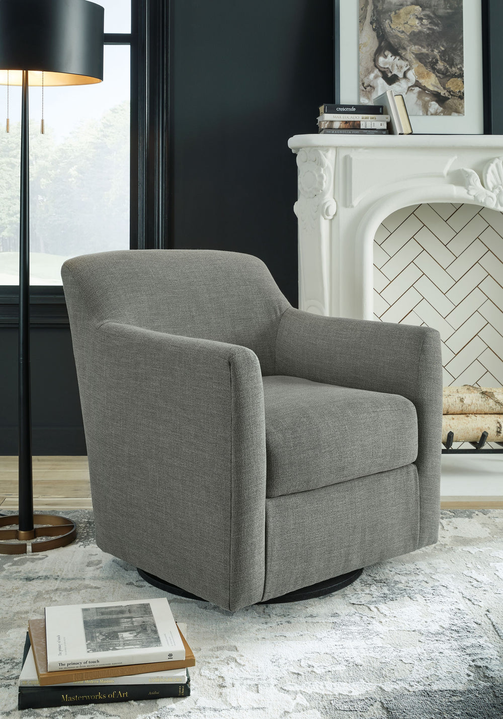 Down with uptown style. This swivel accent chair goes to town with a high-design aesthetic that-'s temptingly affordable. An ideal way to enhance your lounge space, this chair with a 360-degree swivel base brings casually chic style full circle.<br><br><b