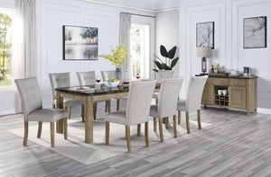 The Charnell dining collection is designed in a transitional style to complement any home. The beautiful marble tabletop and oak finish complement each other beautifully. The standard dining height table and durable marble top will withstand the test of t