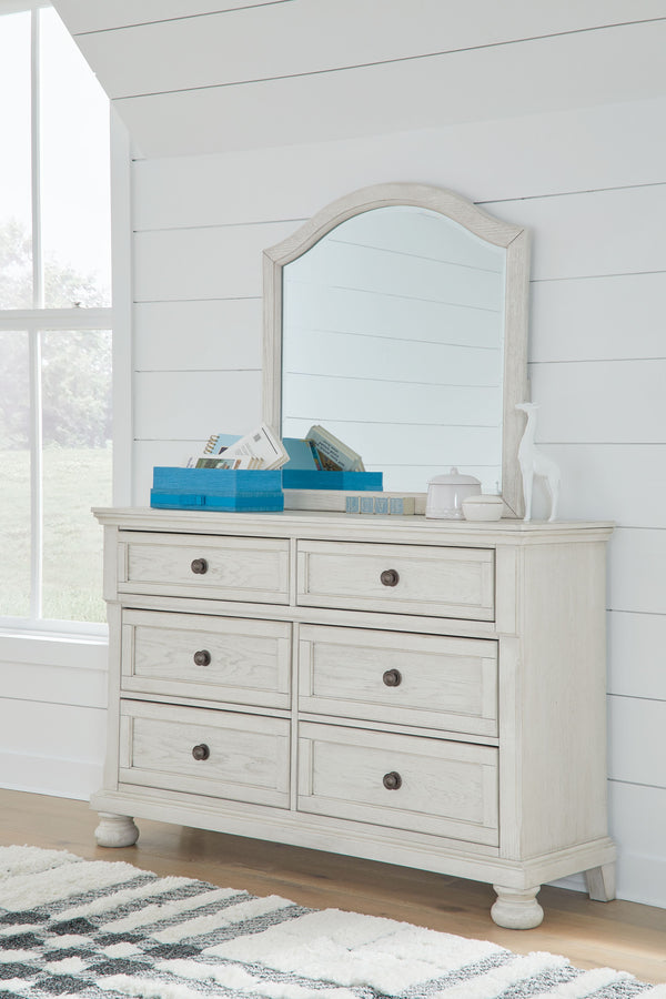  timeless furnishings take your bedroom to the next level. Nothing does that better than this bedroom group. The antiqued white finish with a wonderful grain texture oozes sophistication