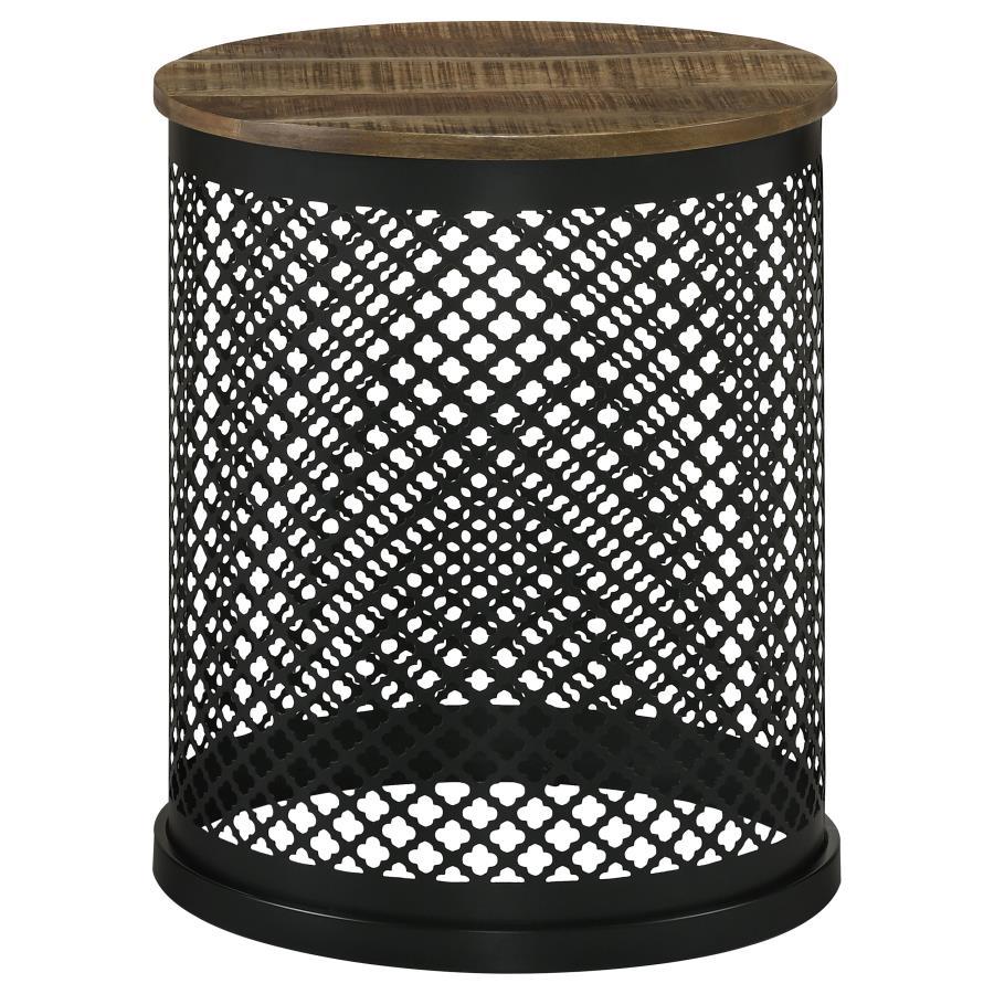 Blending rustic charm with industrial flair, this round accent table makes a striking addition to any space. The solid mango wood top, finished in a deep natural tone, highlights the organic wood grain for a warm, inviting look. The black iron drum base f