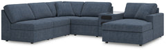 Looking cool and contemporary is great. But when it comes down to it, youâ€™re all about low-maintenance lounging. With the performance fabric on this sectional with chaise, cleaning spills is a breeze. Its customizable modular design caters to your ever-