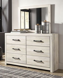 What a delightful take on rustic industrial style. Whether modern loft or modern farmhouse, this dresser and mirror set makes itself at home. The wispy whitewash palette enhances without covering the grain for that weathered look you crave. Elongated draw