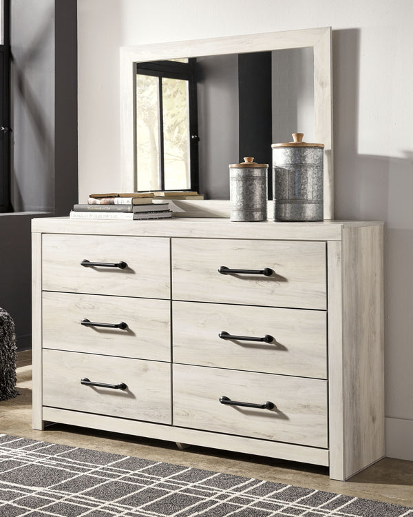 What a delightful take on rustic industrial style. Whether modern loft or modern farmhouse, this dresser and mirror set makes itself at home. The wispy whitewash palette enhances without covering the grain for that weathered look you crave. Elongated draw