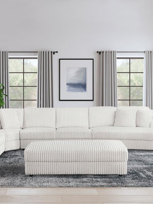  designed to complement your sectional sofa set. Upholstered in luxurious ivory wide corduroy