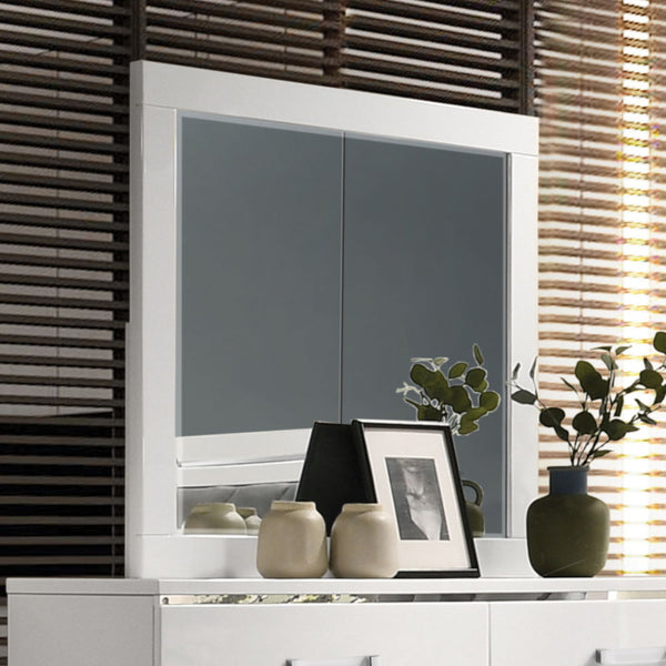 Brilliant accent to add to any modern living space. The Chelsie Mirror is a focal point on its own with its clean and sleek design. Add depth and reflect light with its beveled mirror inlay that features a perfect viewing angle. The white finish is excell