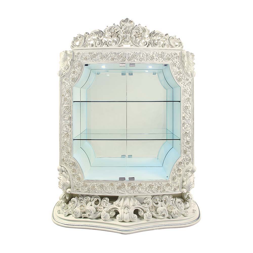 Add to your dining area a unique and alluring element with the Adara curio cabinet. The embellished design provides a captivating piece that is anything but ordinary. This curio cabinet features gorgeous scroll-shaped carvings and a scroll-shaped base. A 