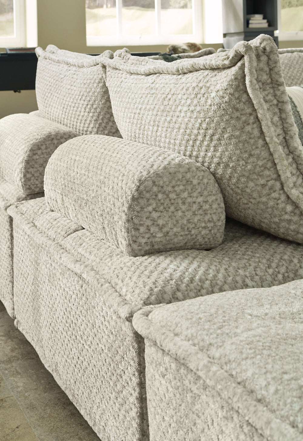Be bold with a modern take on seating. This accent chair set has an armless design and carries a checkered taupe upholstery neutral enough to fit in any style while elevating it at the same time. Thanks to its modular design, making the transformation fro