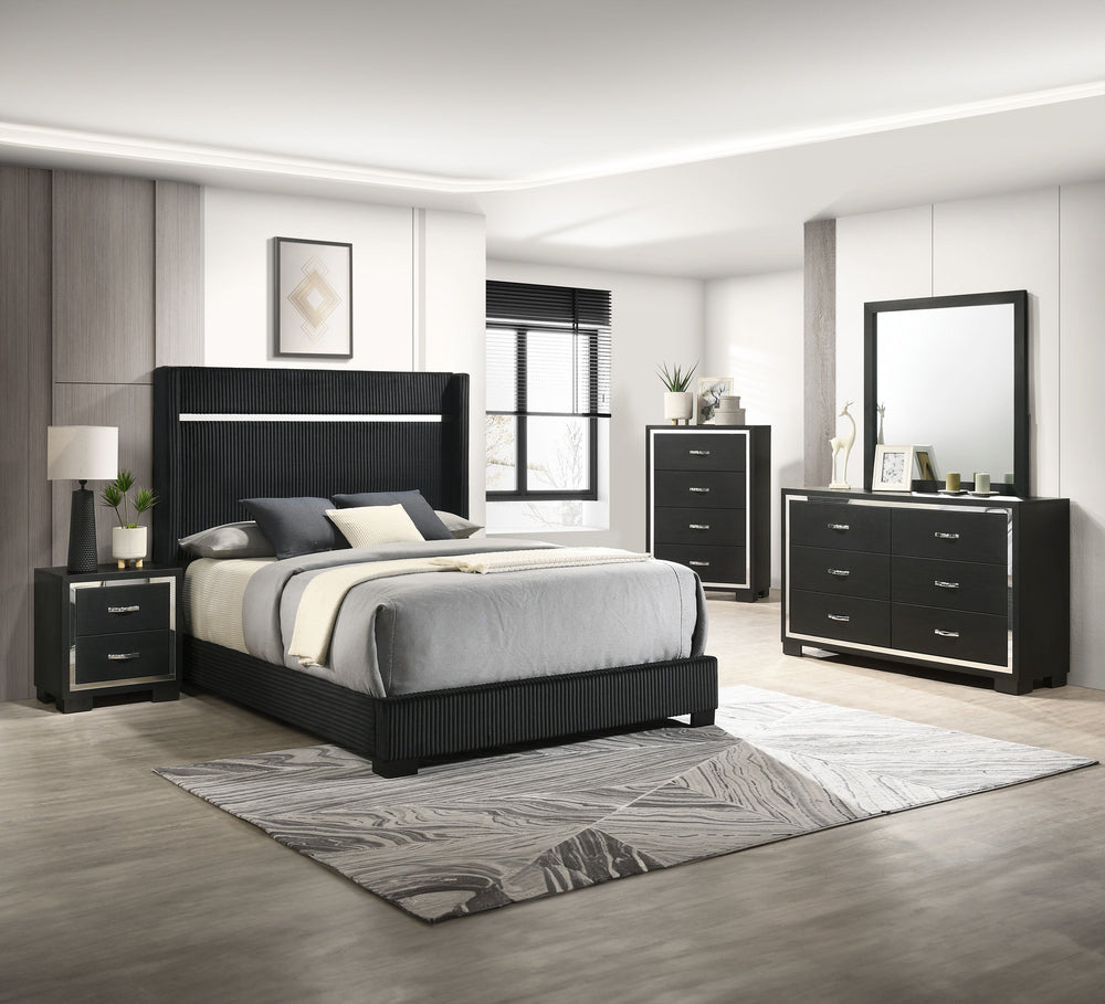 This bedroom collection strikes a balance between bold and classic styles. It features a striking bed with a high, channel tufted headboard that commands attention. The accompanying case goods, including a dresser with a mirror, chest, and nightstand, are