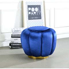 Whether youâ€™re picking up your feet to relax or using it as an extra table during a party, this Heiress ottoman will be a great addition to any arrangement. Founded a top metal round base in a gold finish, the design of this piece will go well with any 