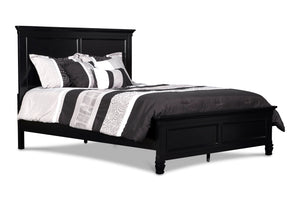 The Tamarack Wood Panel Bed in Black is a true standout, showcasing durable construction with a blend of solid poplar, basswood veneers, and eco-friendly manufactured wood for unmatched strength and longevity. This bed-'-'s versatile transitional style ma