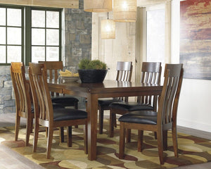 Made with select acacia veneers and hardwood solids. Gently distressed and burnished dark brown finish. D594-35 has a planked table design with thick-look tops and butterfly leaf. Seat covers in brown faux leather. Server features a working drawer along w