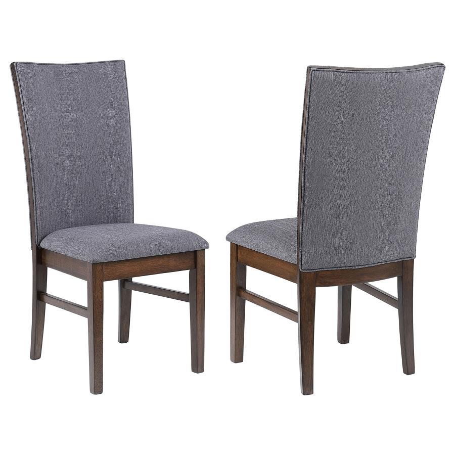 This elegant dining side chair combines comfort and sophistication, making it the perfect complement to any dining table. Upholstered in soft gray fabric on both sides of the backrest and the seat, it offers a cohesive and refined look. The sturdy frame i