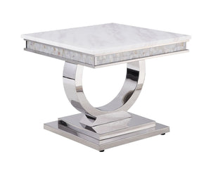 This beautiful contemporary work places a strong emphasis on lustrous materials that make a bold statement of personality and style. Shiny metal frame and white marble top complement each other perfectly, making the table more visually appealing. The Zand