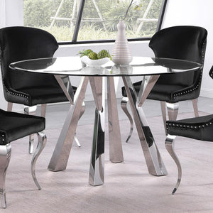  the table boasts a geometric base design crafted in metal with rich angularity and elegance. Gleaming chrome finish plays u