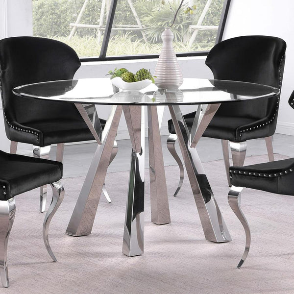  the table boasts a geometric base design crafted in metal with rich angularity and elegance. Gleaming chrome finish plays u