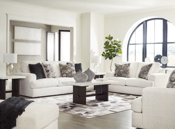Craving casual refinement? This seating package has you covered. A decidedly contemporary frame cradles sizable cushions in an ultra-soft neutral hue, lightening the mood in your living room with simple style and everyday comfort. Solid and geometric acce