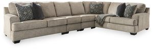 Whether your vision is clean and contemporary or cozy modern farmhouse, this sectional in a stone-tone neutral upholstery has the corner on style. Merging ultimate comfort with striking good looks, this chic sectional includes coordinating accent pillows 