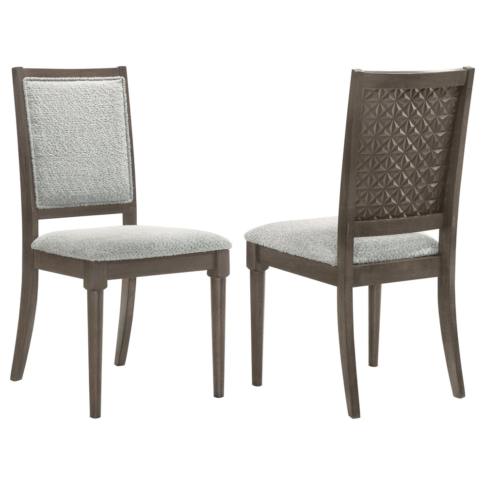 Elevate your dining space with this beautifully crafted dining chair, blending intricate detailing with luxurious comfort. The chair features a molded geometric design on the backrest, offering a striking visual appeal. Constructed from solid wood and emb