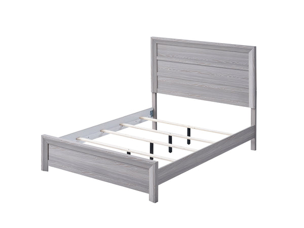  featuring a neutral drift wood finish that complements its clean and contemporary design. The robust bed frame anchors the room with a sense of sturdiness and style. Accompanying the bed ar