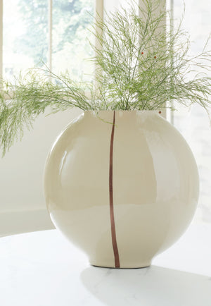  shelf or foyer with this vase. An eye-catching metallic accent showcases its softly rounded shape