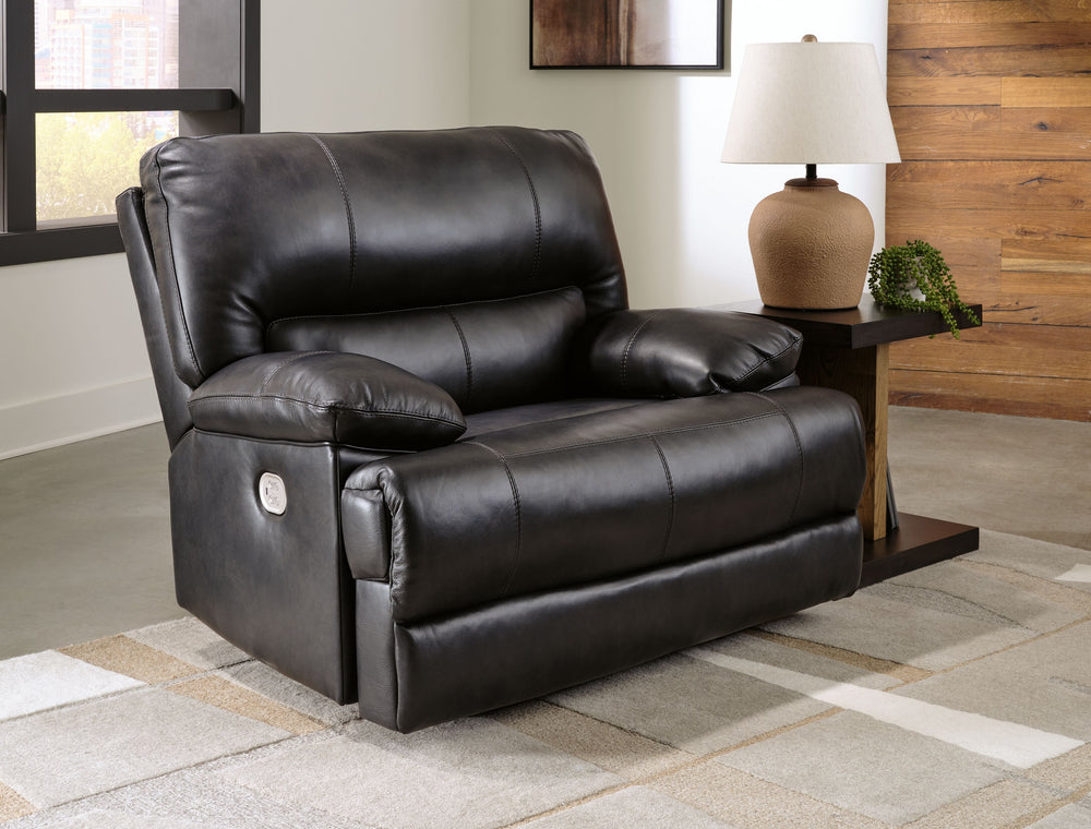 Striking form, meet contemporary function. This power recliner combines your ideal comfort features, like one-touch reclining and adjustable headrests, into one sophisticated package. With a design defined by the luxe look of black leather, this recliner 