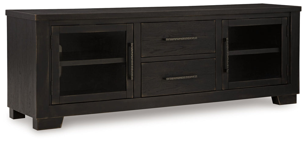 This TV stand brings a rustic vibe to urban contemporary design. Itâ€™s a modern approach to natural beauty, with the worn black finish giving your living room a gently aged charm. Console and media storage is made easy with cabinets and drawers. And the 