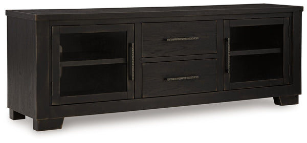 This TV stand brings a rustic vibe to urban contemporary design. Itâ€™s a modern approach to natural beauty, with the worn black finish giving your living room a gently aged charm. Console and media storage is made easy with cabinets and drawers. And the 