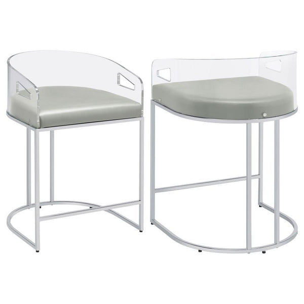Ultra-modern with a retro-inspired vibe, this pair of stools make a striking piece to a dining room space. With a curved backrest in a clear acrylic material, each stool offers an open and airy design. Rest comfortably on a leatherette cushion as you dine