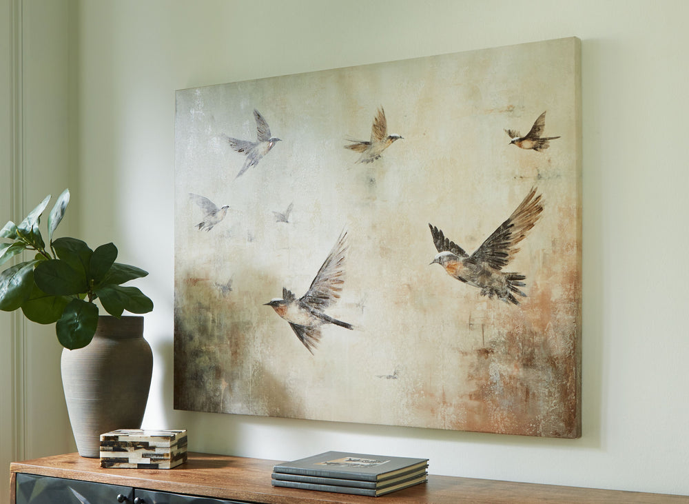 This canvas takes neutrals to the next level for a city-chic vibe. Hand-painted embellishments add textural interest while birds of a feather flocking together bring a touch of nature indoors. This striking piece of wall art is a standout in practically a