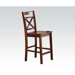 The Tartys collection complete your dining area with this set of two cherry-finished chairs with an ageless design to complement any style. The X-shaped back adds style and help support your back, and the tapered legs feature a solid footrest on all sides
