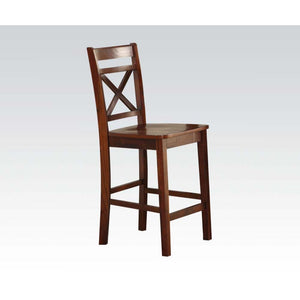The Tartys collection complete your dining area with this set of two cherry-finished chairs with an ageless design to complement any style. The X-shaped back adds style and help support your back, and the tapered legs feature a solid footrest on all sides