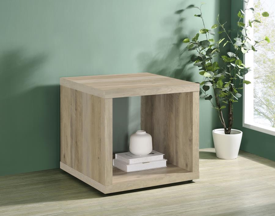 This end table blends a simple cubic silhouette with rustic charm, perfect for farmhouse or modern living rooms. Crafted from durable engineered wood, it features a wood-look finish that enhances its earthy aesthetic. An open design with a lower shelf off