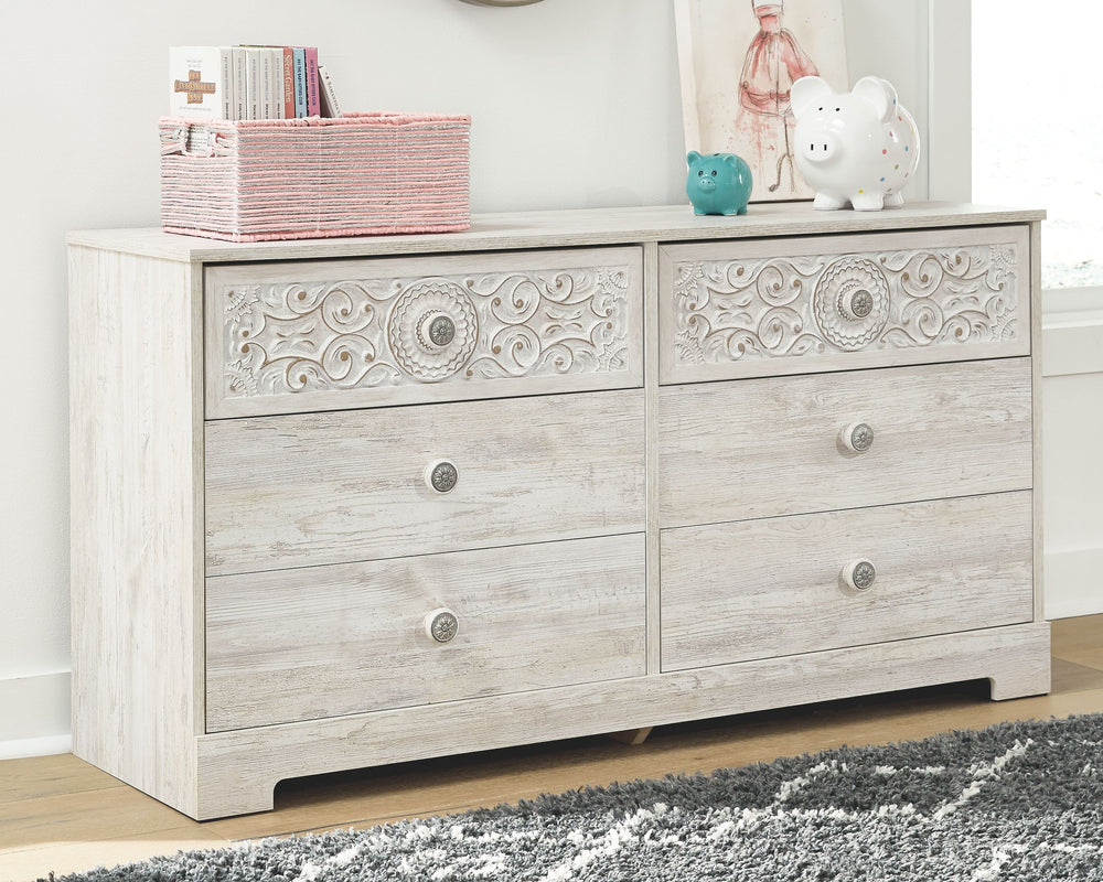 If itâ€™s coastal chic or cottage quaint style you long for, this whitewashed dresser invites you to go to town. Its distinctive weatherworn finish conveys an easy-breezy sensibility, perfect for a restful bedroom retreat. Tastefully edited lines and meda