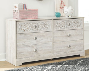  this whitewashed dresser invites you to go to town. Its distinctive weatherworn finish conveys an easy-breezy sensibility